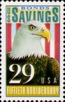 Colnect-199-786-Bald-Eagle-Haliaeetus-leucocephalus-with-Flag.jpg