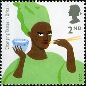 Colnect-449-152-African-Woman-Eating-Rice.jpg