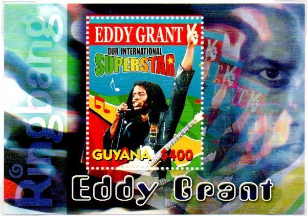 Colnect-4814-356-Eddy-Grant-singing-with-Guitar.jpg