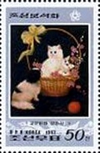 Colnect-2500-168-Cat-in-basket-with-dog-and-skein.jpg