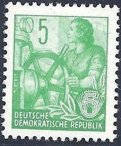 Colnect-1463-306-Woman-at-the-steering-wheel.jpg