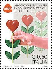 Colnect-531-800-Hand-that-picks-an-heart-shaped-flower.jpg