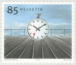 Colnect-528-254-Station-clock-1944-designed-by-Hans-Hilfiker-1901-93.jpg