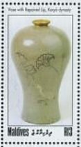 Colnect-4916-887-Vase-with-repaired-lip.jpg