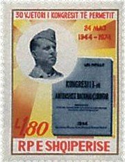 Colnect-1435-979-Enver-Hoxha-and-front-page-of-1944-Congress-Book.jpg