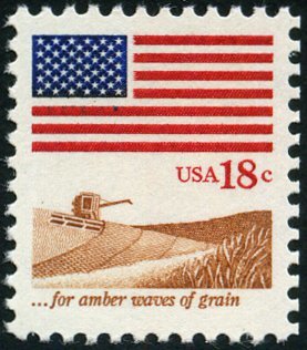 Colnect-4845-863--For-Amber-Waves-of-Grain---Flag-and-field-of-wheat.jpg