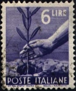 Colnect-1143-951-Hand-planting-an-olive-tree.jpg