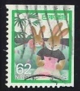 Colnect-2925-453-Two-Rabbits-with-letter-Top-and-Right-imperforated.jpg