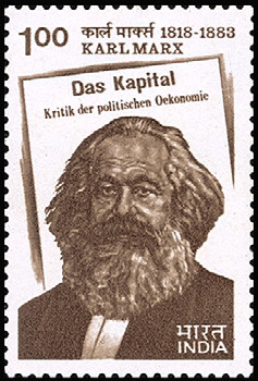 Colnect-2523-679-Karl-Marx-and-Das-Kapital.jpg