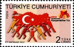 Colnect-1461-079-People-Carrying-Turkey-Map-with-Turkish-Flag-Colors.jpg