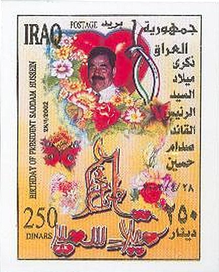 Colnect-2564-672-Saddam-in-front-of-a-red-heart-flowers.jpg