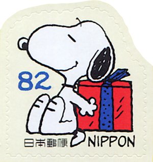 Colnect-5401-875-Snoopy-and-Gift.jpg
