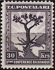 Colnect-985-317-Olive-Tree-with-Roots-Extending-to-All-Balkan--Capitals.jpg