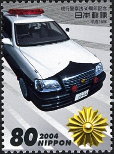 Colnect-899-584-Police-patrol-car-and-the-emblem.jpg