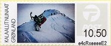 Colnect-4216-931-Snowmobile-on-mountain.jpg
