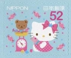 Colnect-4138-590-Hello-Kitty-Teddy-Bear-on-Scale-Sanrio-Characters.jpg