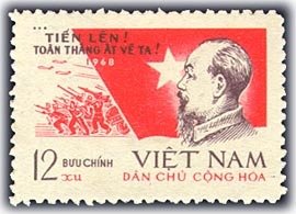 Colnect-1652-731-Ho-Chi-Minh-and-flag.jpg