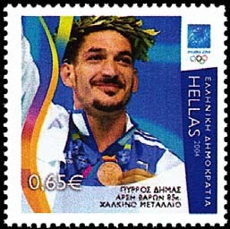 Colnect-785-070-Athens-2004--Pyrros-Dimas-Bronze-Medal-Weightlifting.jpg