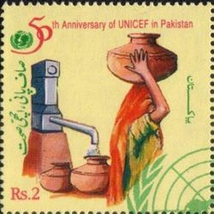 Colnect-2145-049-Pakistani-Woman-carrying-Water-Pot.jpg