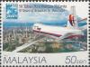 Colnect-4689-158-Boeing-747-400-over-Kuala-Lumpur.jpg