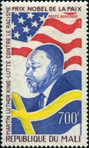 Colnect-2475-835-Martin-Luther-King-1929-1968-and-Flags-of-USA-and-Sweden.jpg