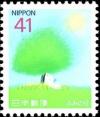 Colnect-2178-774-Puppy-Reading-Letter-under-Tree.jpg