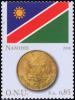 Colnect-2542-681-Flag-of-Namibia-and-5-dollar-coin.jpg