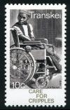 Colnect-1712-301-Man-in-wheelchair.jpg