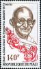 Colnect-2502-177-Mahatma-Gandhi-1869-1948-and-Roses.jpg
