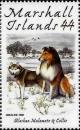Colnect-6004-549-Alaskan-Malamute-and-Collie-Canis-lupus-familiaris.jpg