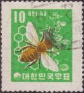 Colnect-2336-092-European-Honey-Bee-Apis-mellifera-Honeycomb-and-Clover.jpg