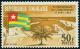 Colnect-5138-106-Lom%C3%A9-Harbor-and-Togolese-flag.jpg