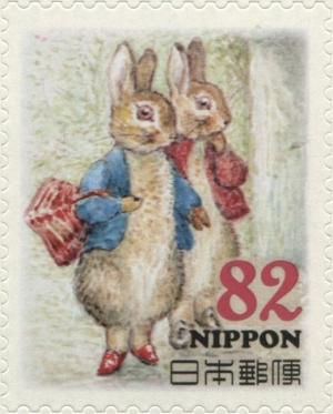 Colnect-3046-977-Rabbits-with-Basket-Peter-Rabbit-Characters.jpg
