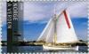 Colnect-503-542-Sail-boat---Lyngor-lighthouse.jpg