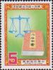 Colnect-3037-226-Law-Book-and-Scale.jpg