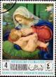 Colnect-2090-120-Madonna-with-child-on-a-green-pillow--by-Andrea-Solari-1460.jpg