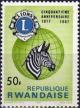 Colnect-2169-529-Lions-Emblem-Globe-and-Plains-Zebra-Equus-quagga.jpg
