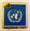 Colnect-3410-947-UN-Emblem-and-Bhutan-Flag.jpg