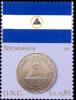 Colnect-2544-020-Flag-of-Nicaragua-and-1-Cordoba-coin.jpg