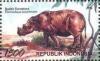 Colnect-1142-345-Sumatran-Rhinoceros-Dicerorhinus-sumatrensis.jpg