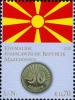 Colnect-4928-411-Flag-of-Macedonia-and-50-denar-coin.jpg