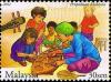 Colnect-4348-054-Chidren-at-play.jpg