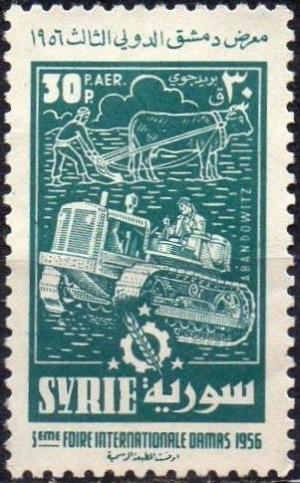 Colnect-1128-749-Bullock-plough-and-Tractor.jpg
