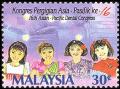 Colnect-1052-663-Asian-Pacific-Dental-Congress--Girls-smiling.jpg