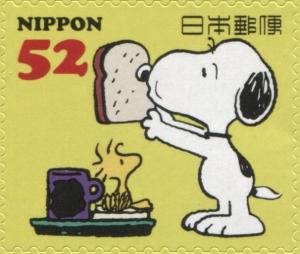 Colnect-3047-102-Snoopy-Holding-Bread-near-Woodstock.jpg