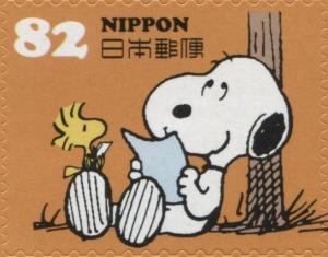 Colnect-3047-117-Snoopy-Reading-Letter-with-Woodstock.jpg
