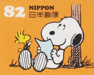 Colnect-6264-474-Snoopy-Reading-Letter-with-Woodstock.jpg