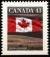 Colnect-2842-772-Canadian-Flag-over-Field.jpg