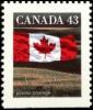 Colnect-2393-968-Canadian-Flag-over-Field.jpg