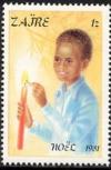 Colnect-1114-962-Child-lightning-a-candle.jpg